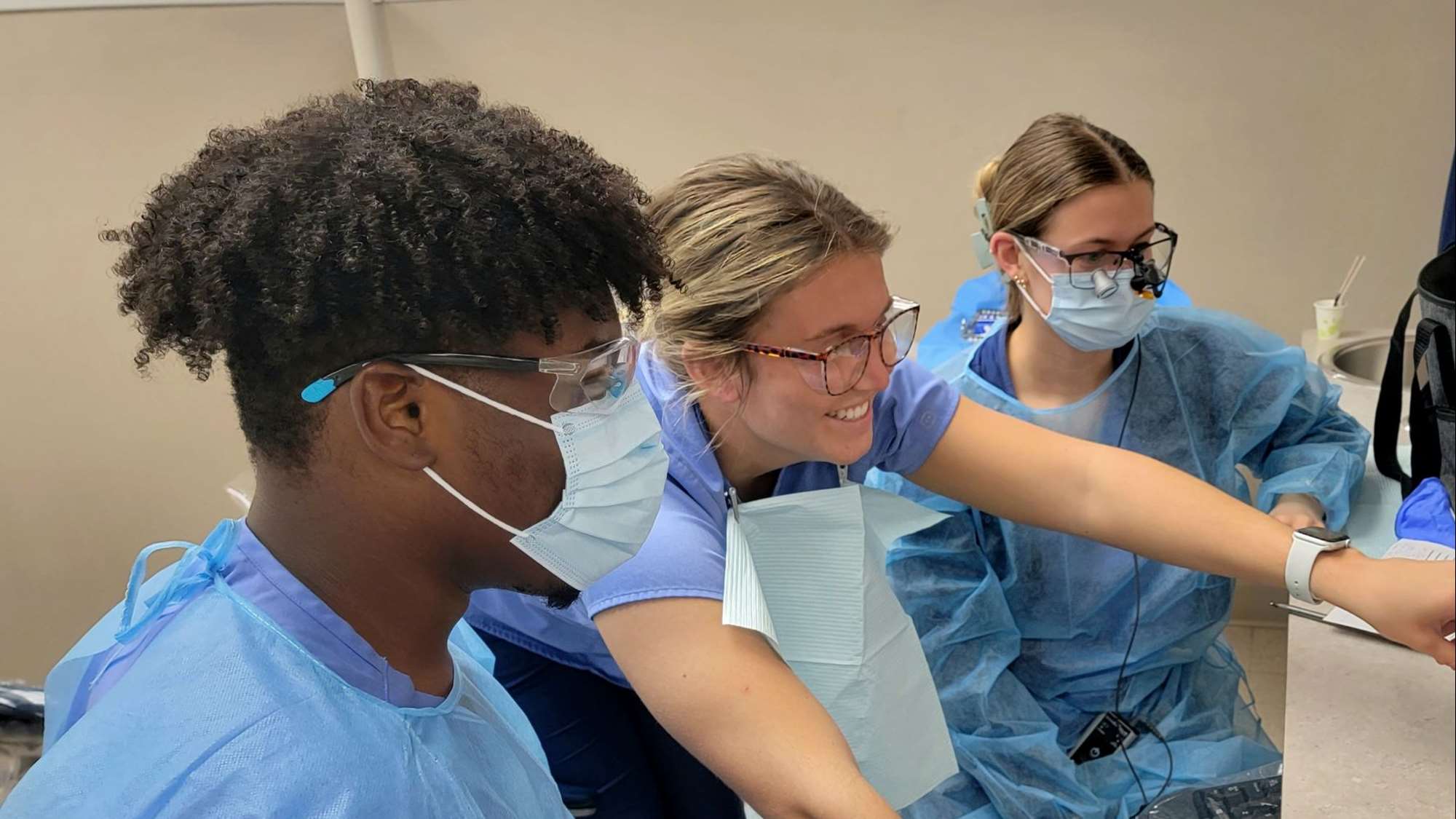 Dental hygiene students work together in the clinic.