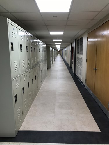 Dental student hallway received a makeover improving the floor, walls, ceilings and lockers.