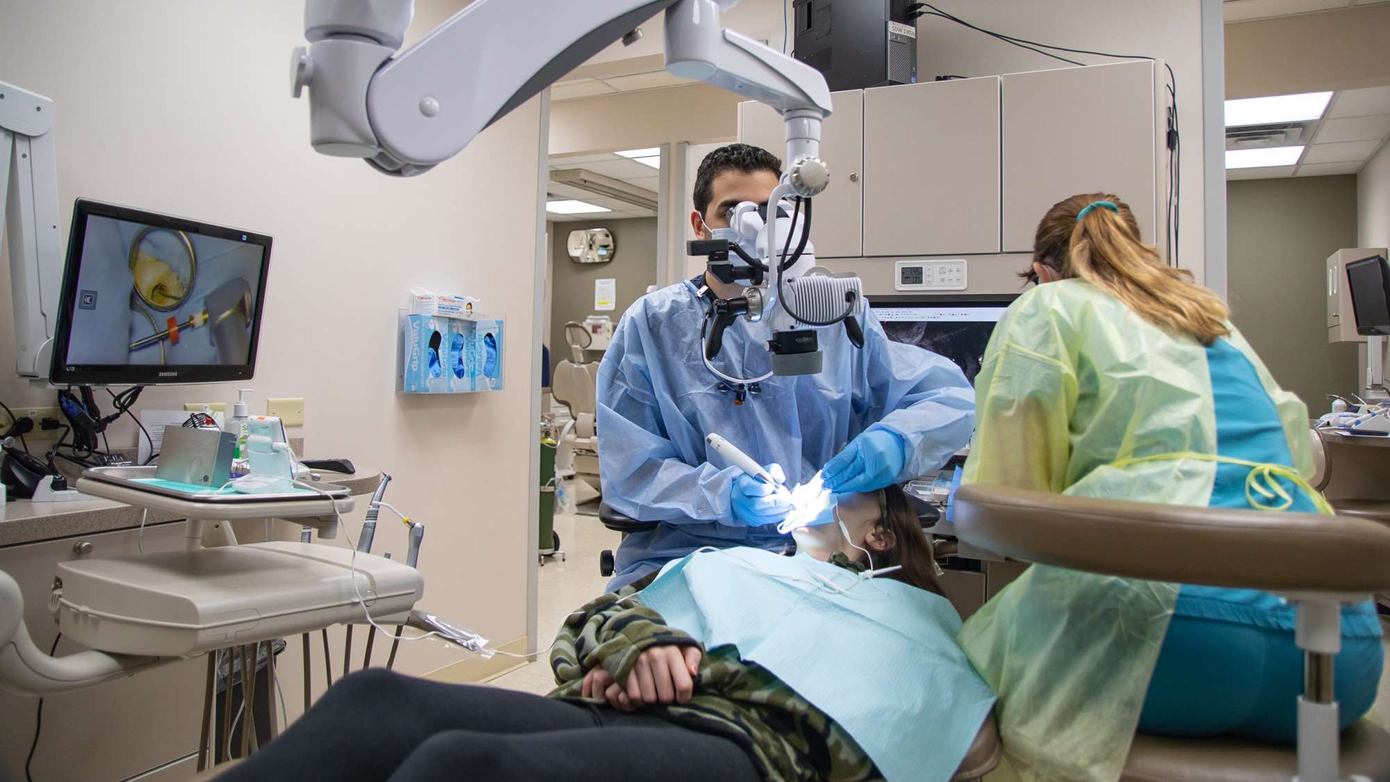 An endodontics resident's patient receives root canal treatment. 