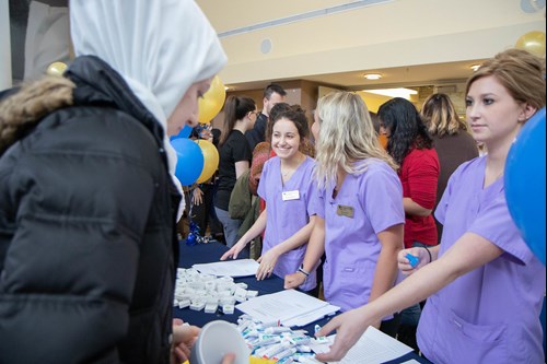 Dental hygiene students join other health professional students for overall health awareness.